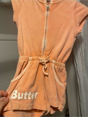 Jumper in nectarine color short sleeve with hood